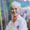 Judy Murray Smiling Wearing Lab Coat