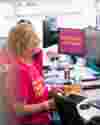 Worldwide Cancer Research team member working at desk